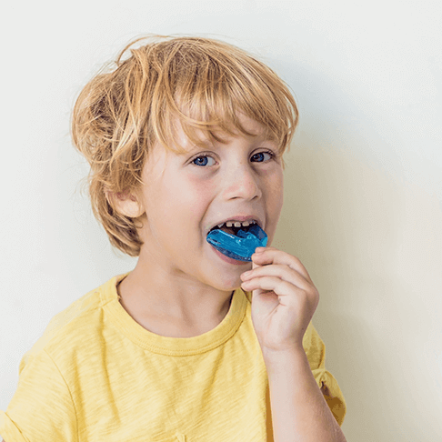 boy with mouthguard